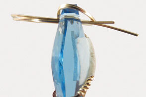 Wire wrapped around marquise pendant